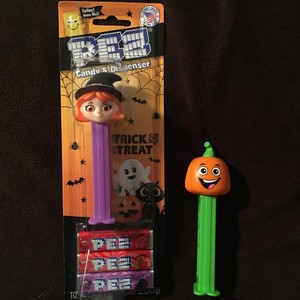 PUMPKIN AND NEW WITCH IN ORIGINAL PACKAGE WITH 3 PEZ CANDY PACKS