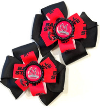 Beautiful Ball State Cardinals inspired set of pigtail hair bows for girls.