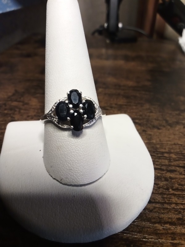 925 Ring with 4  Oval Faceted Black Onyx Gems, Marked STS, 925 ,Size 10. 25 