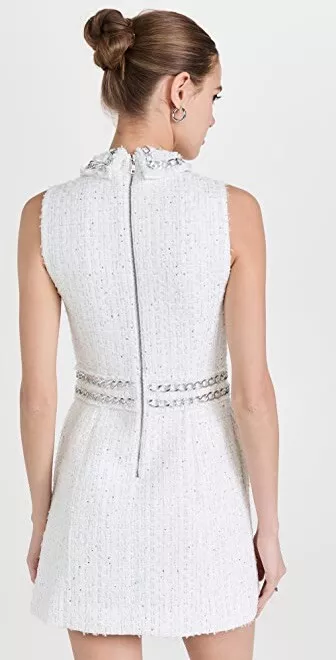 Tweed playsuit with chain trims hotsell