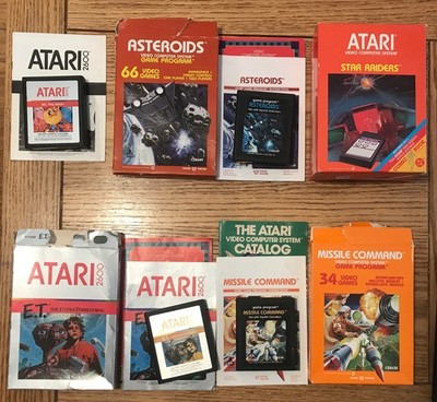 Lot of 5 Atari 2600 games, 4 CIB complete in box. W/ catalogs, comic book, etc.
