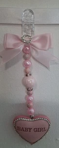 *new*Pink baby girl wording on a pink love heart with pink bow and diamonti 