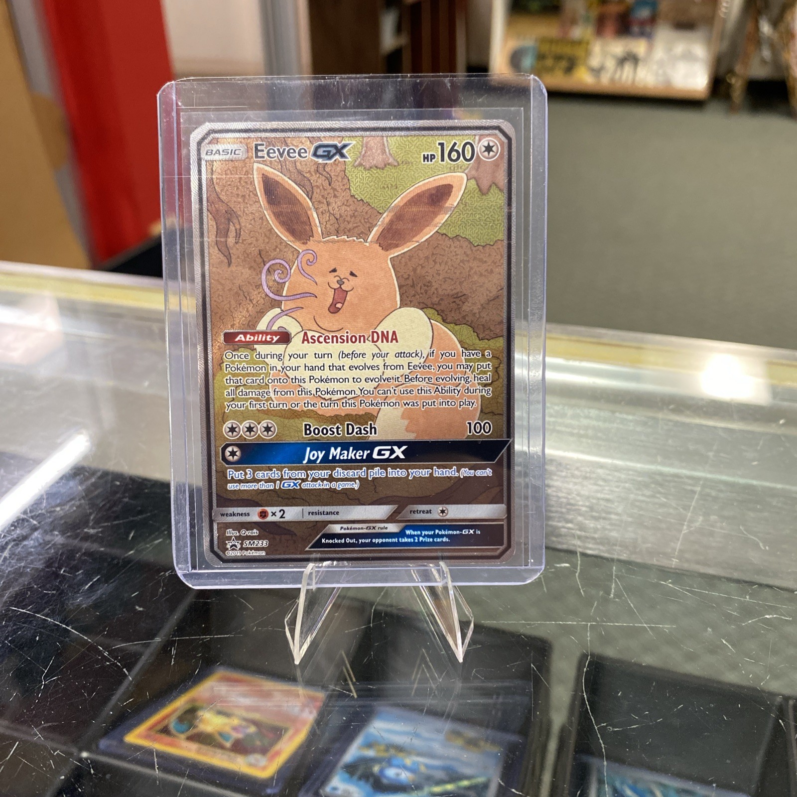 Eevee GX - SM233 - Pokemon Sun & Moon Promo Ultra Rare Card