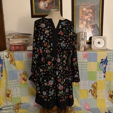 Black floral midi dress with bell sleeves and tie waist