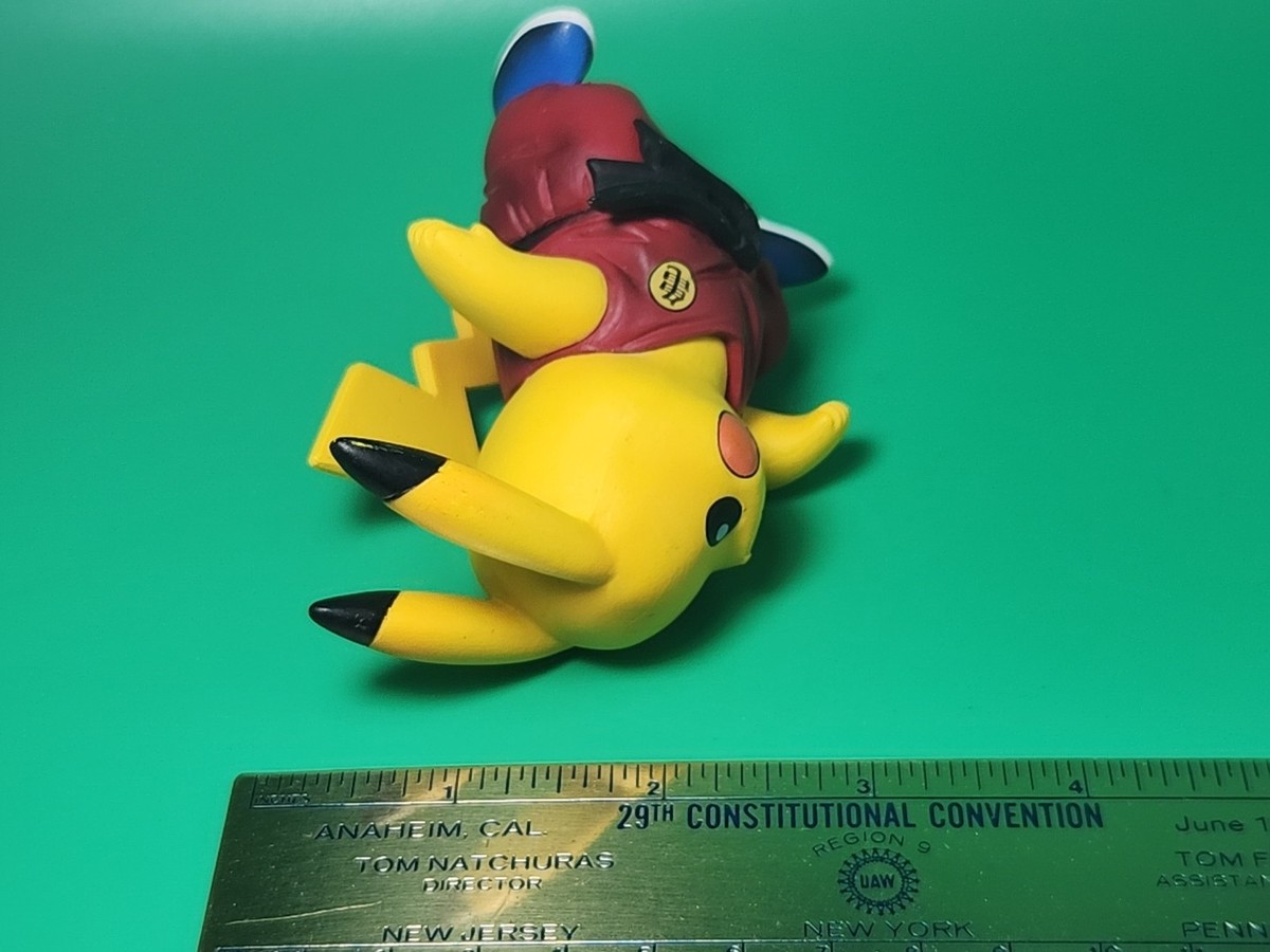 Figurine Pokémon Bandai Pikachu Cosplay PVC – Mélange Dragon Ball Z Songoku ?
