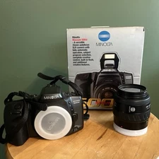 Minolta Maxxum 500si 35mm SLR Film Camera with 35-70mm lens & 49mm lens cover