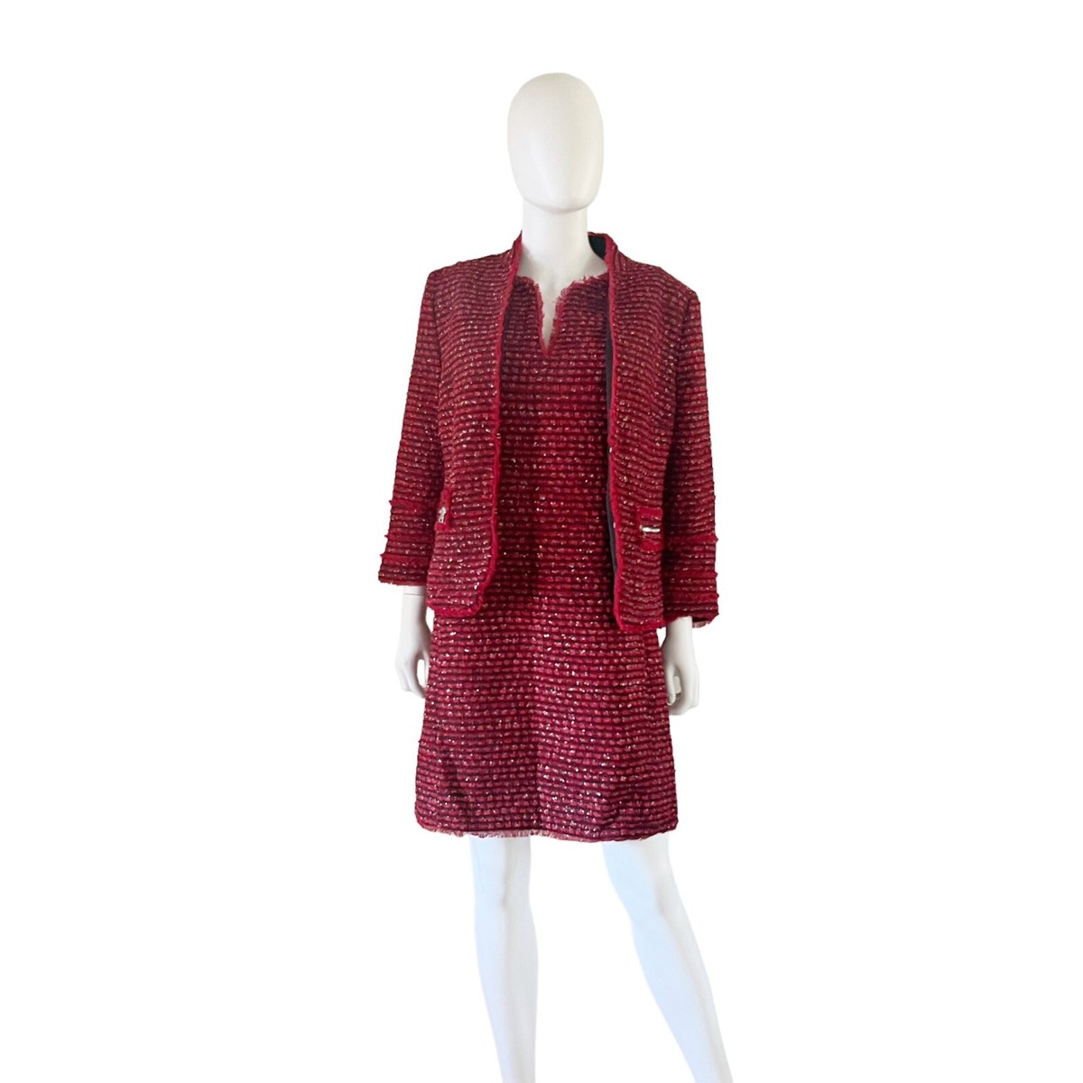 red and black tweed dress Meet the Tae Dressthe ultimate showstopper for the season. Crafted from  luxe red tweed with bold padded shoulders and chic gold button details,  this dress is the perfect blend of timeless elegance