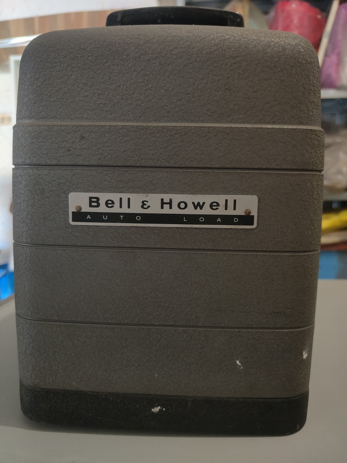 Bell & Howell Proiettore film 245A grigio, caricamento automatico, custodia