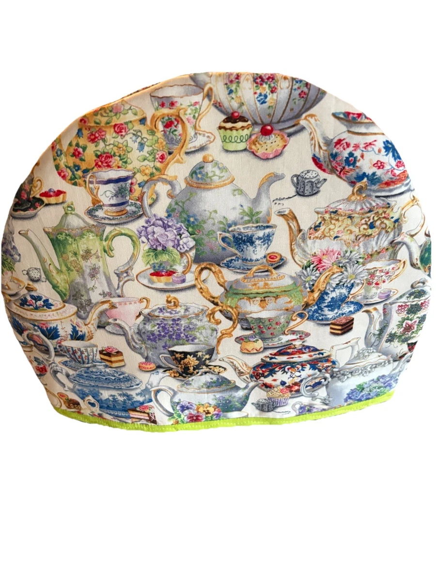 What a cute idea for a teapot! /sewing to a  tea the hidden pin cushion