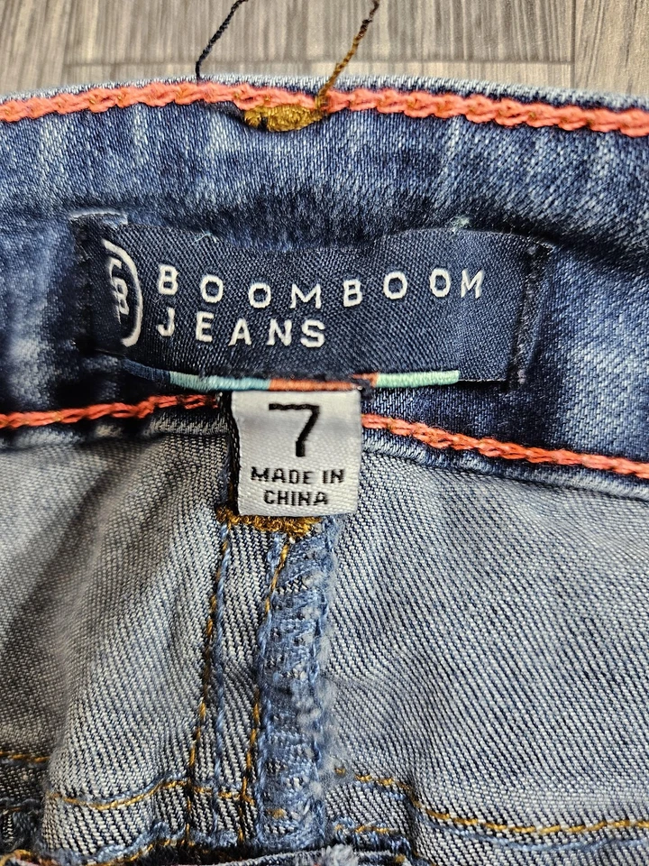 Pantalones de mezclilla Boom Boom de tiro bajo ajustados para mujer 7 botones elásticos desgastados Foto 4 de 4