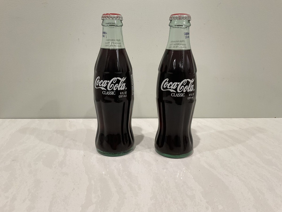 COCA-COLA DELTA AIRLINES FLIGHT ATTENDANT COKE BOTTLE NEW 58 YEARS 