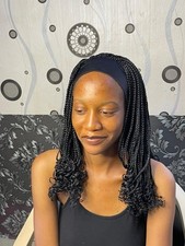 Headband braided curly wig.Color Is Black. Length Is 16inches Long.ready to ship