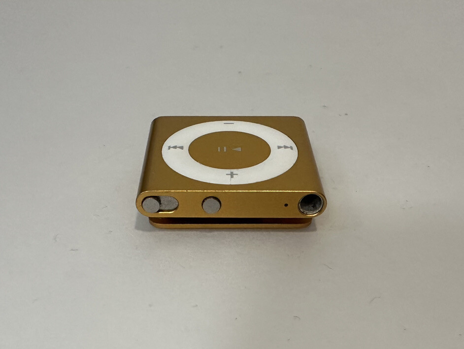 Apple iPod shuffle 4th Generation Orange (2 GB) Works Great