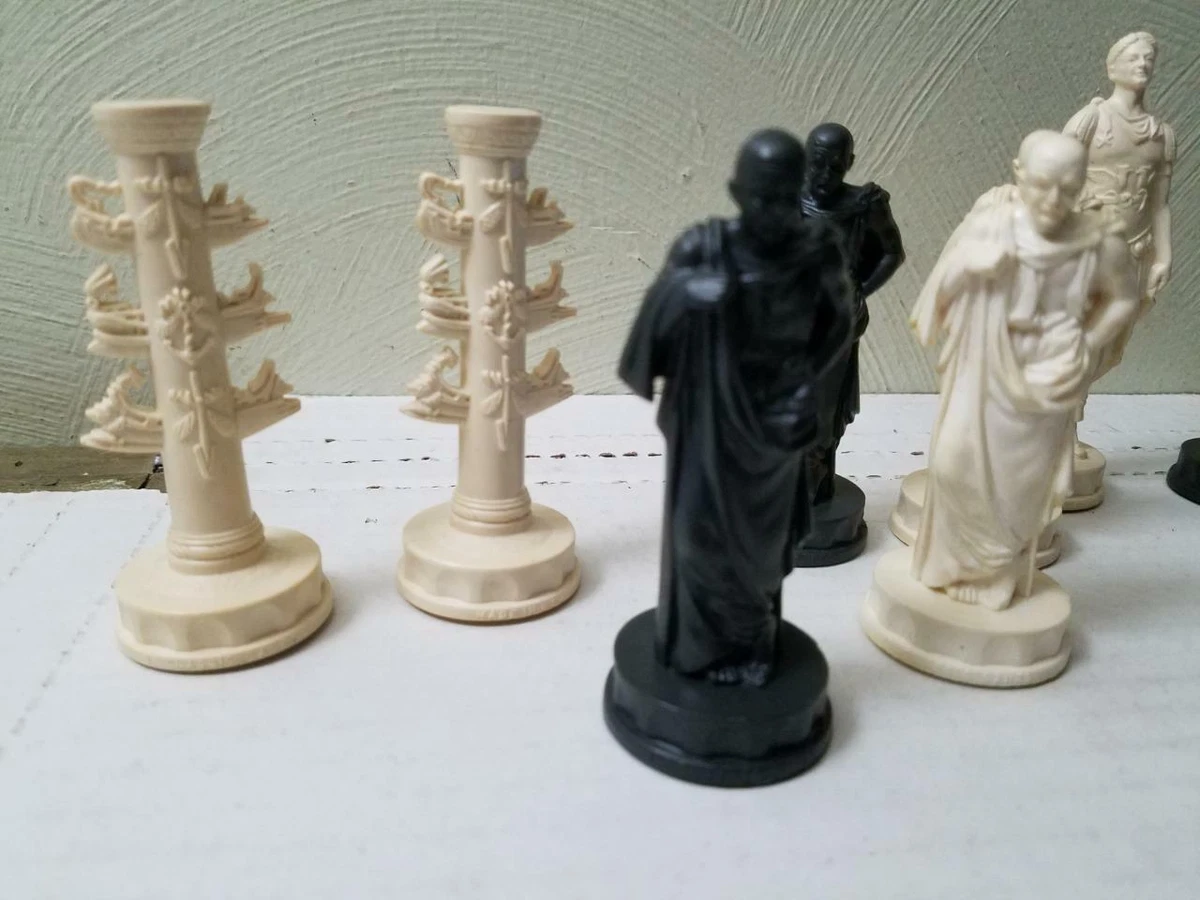 One statue of chess king + queen + rook + bishop +