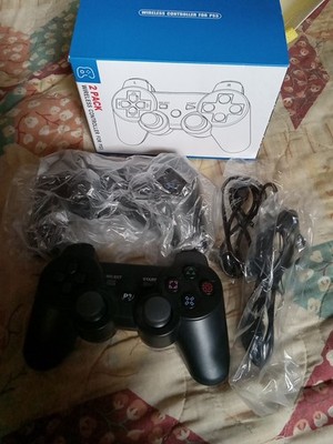   2- ps3 wireless controllers  NIB