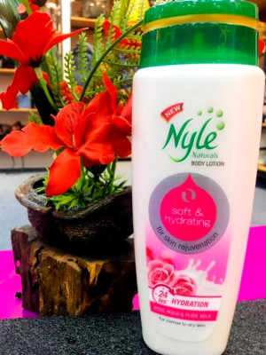 Nyle Rose Aqua & pure milk body lotion.  rose sent _  cream   superb body lotion