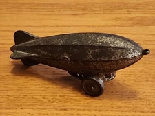 Vintage Antique Cast Iron Blimp Dent? AC Williams?