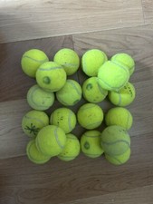25 used tennis balls for dog toys