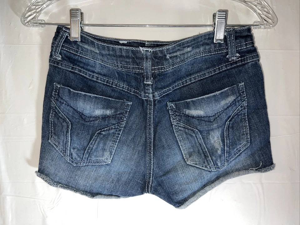Pantalones Cortos Miley Cyrus Tiro Bajo Dobladillo Crudo Denim Elastizados Talla 7 (Cintura 28") Foto 4 de 4