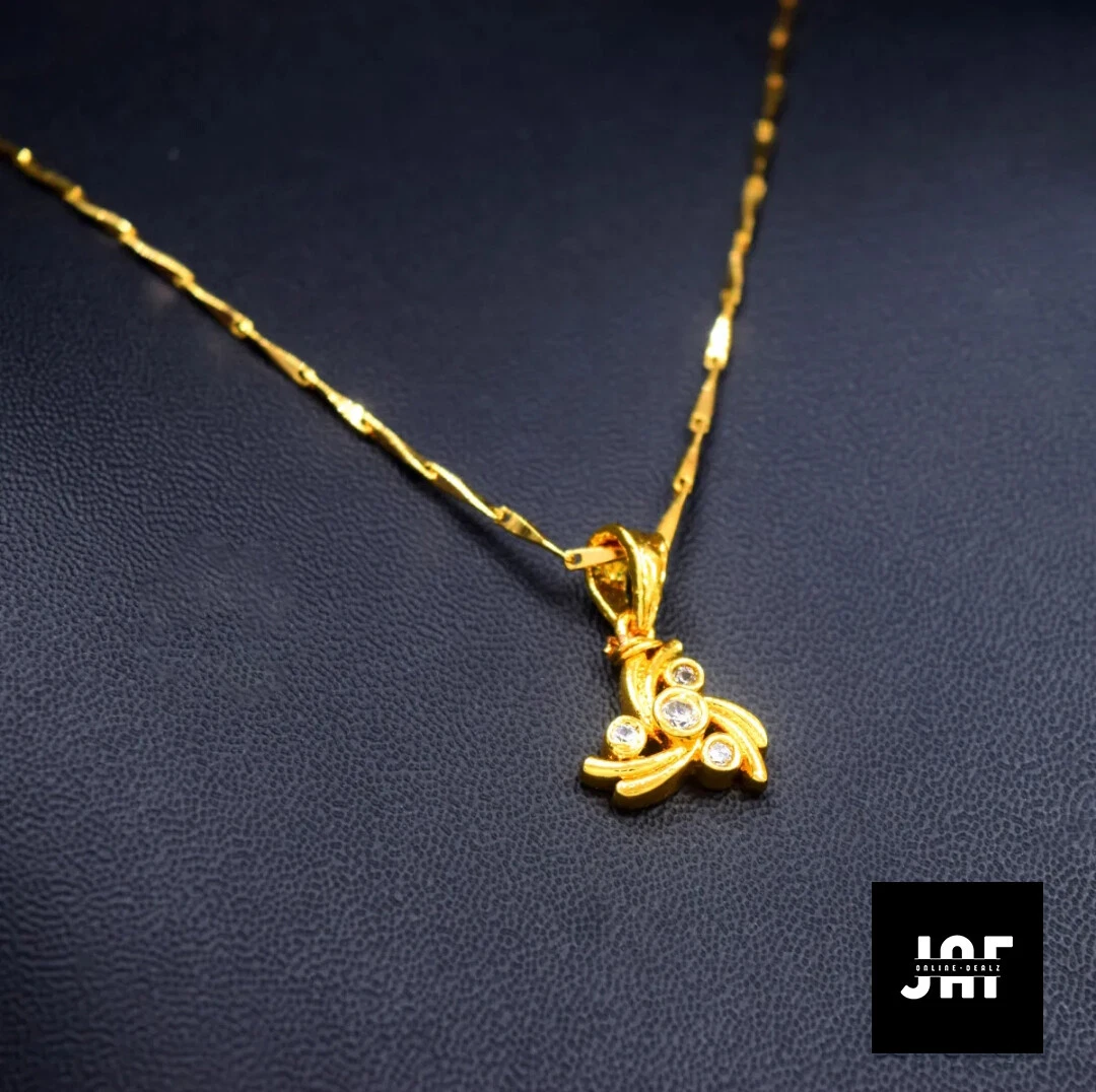 Gold necklace with store stone pendant