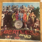 The Beatles Sgt. Pepper’s US Vinyl LP 1976 Capitol Records Orange Label Pressing