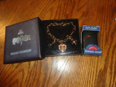 Harry Potter. Gryffindor Charm bracelet and Hogwarts express charm in box