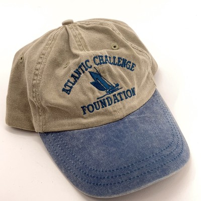 Atlantic challenge foundation Rockland Maine sailboat beige over blue cap