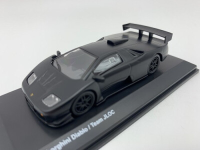 Lamborghini Diablo Team JLOC Kyosho im Maßstab 1:64 in Vitrine OVP NEU