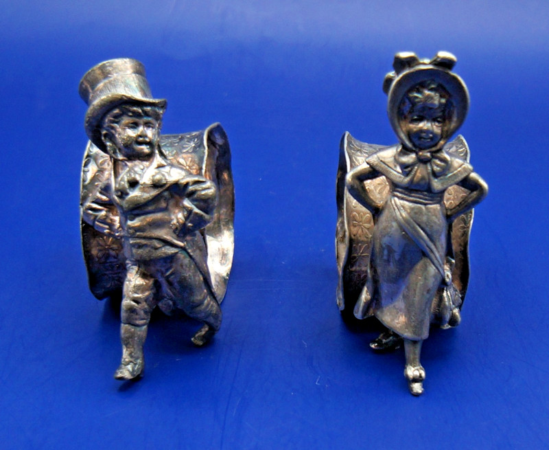 ANTIQUE SILVERPLATED NAPKIN RING "DAPPER YOUNG MAN"  AND IT'S MATE