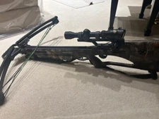 400 quad Barnett, lighted Excalibur  range scope, much better than OEM equipment