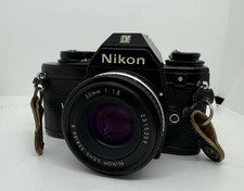 Nikon EM 35mm SLR Film Camera w/Nikon 50mm f/1.8 Lens Kit- with extras