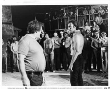 Clint Eastwood shirtless and having a ready to fight look on his fa Old Photo