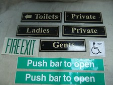 COMERCIAL DOOR SIGNS.