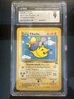 CGC 9—2001 Flying Pikachu #25 WOTC Black Star Promo