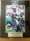Signed Dan Marino 5x7 colr photo matted to 8x10 w/coa