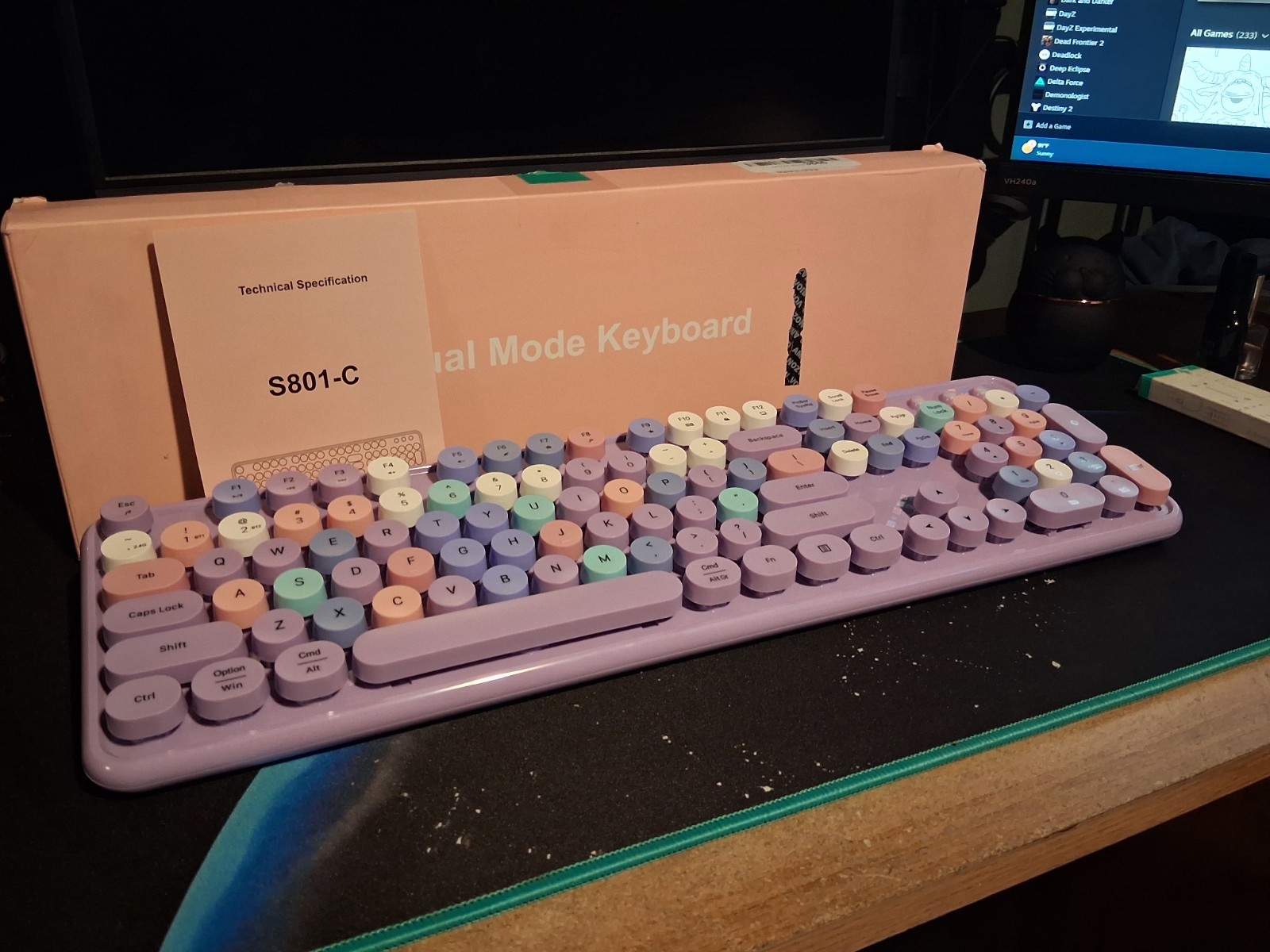 Purple wireless Bluetooth keyboard for multiple devices