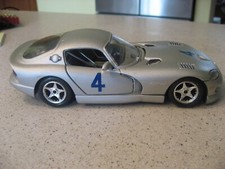 Burago 1/24 - Bündel Ferrari Testarossa Weiß + Dodge Viper Blau