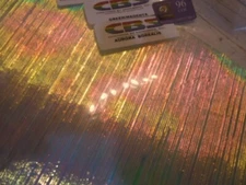 Dichroic Glass:CBS 96 COE Aur. Borealis Green/Magenta on Thin Fibroid Black-3"Sq