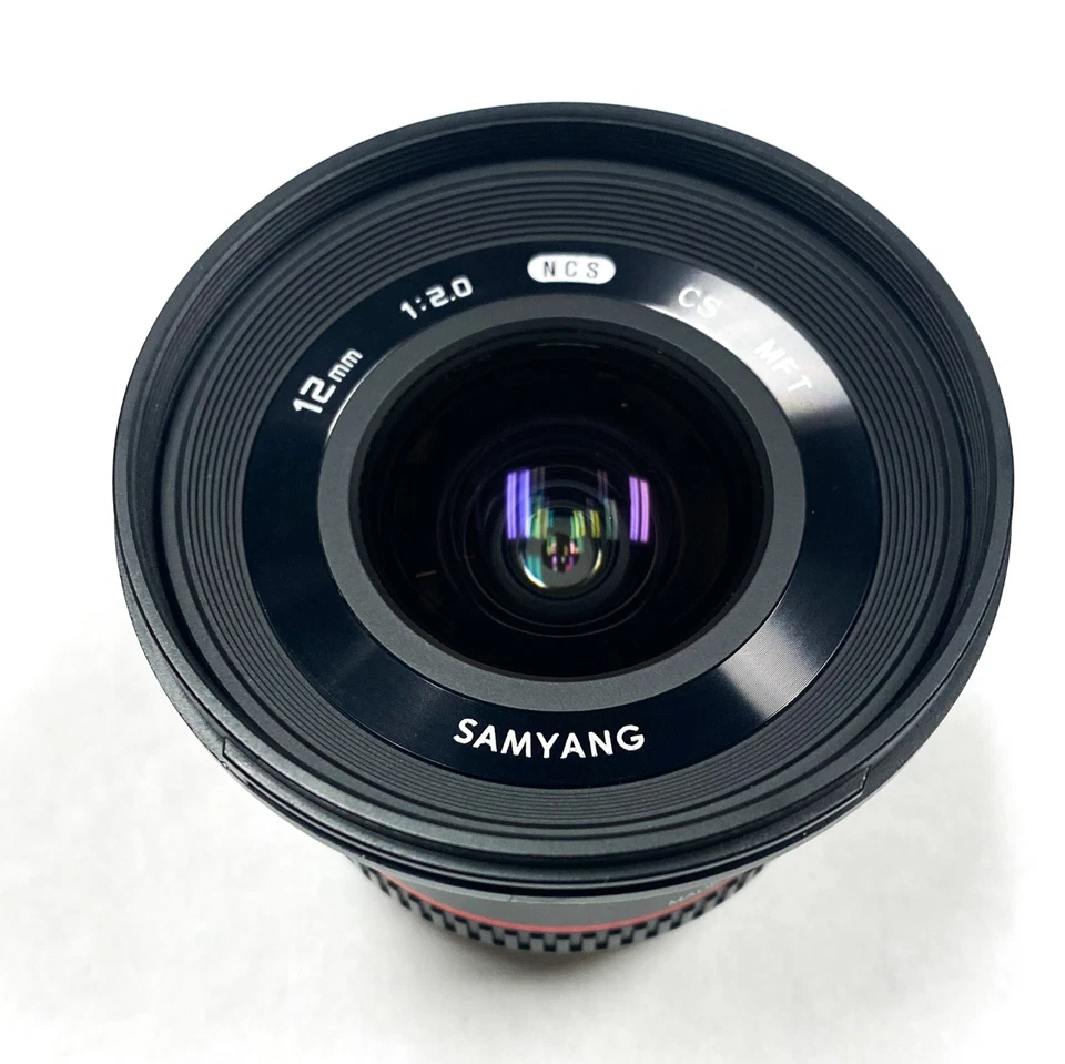 Lente de enfoque manual ultra gran angular Samyang 12 mm F2.0 NCS CS Micro 4/3 ¡LIMPIA! Foto 3 de 4