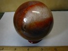 1.21b 2.8in CARNELIAN AGATE AND QUARTZ SPHERE ORANGE/REDS/WHITE MADAGASCAR #211 — photo 5