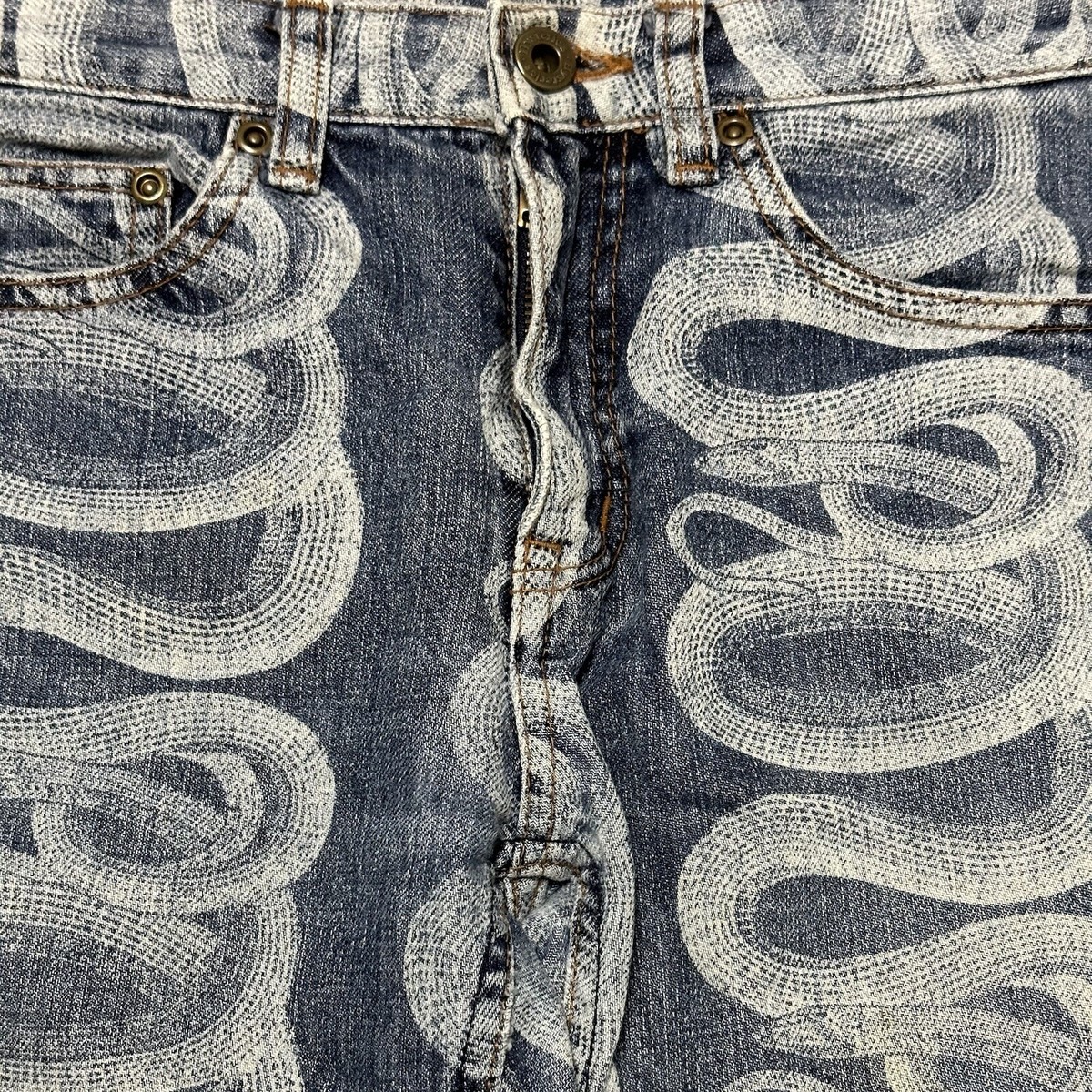 【DISCERNMENT】Snake flap button denim pants DISCERNMENT】Snake flap button denim pants Spick and Span