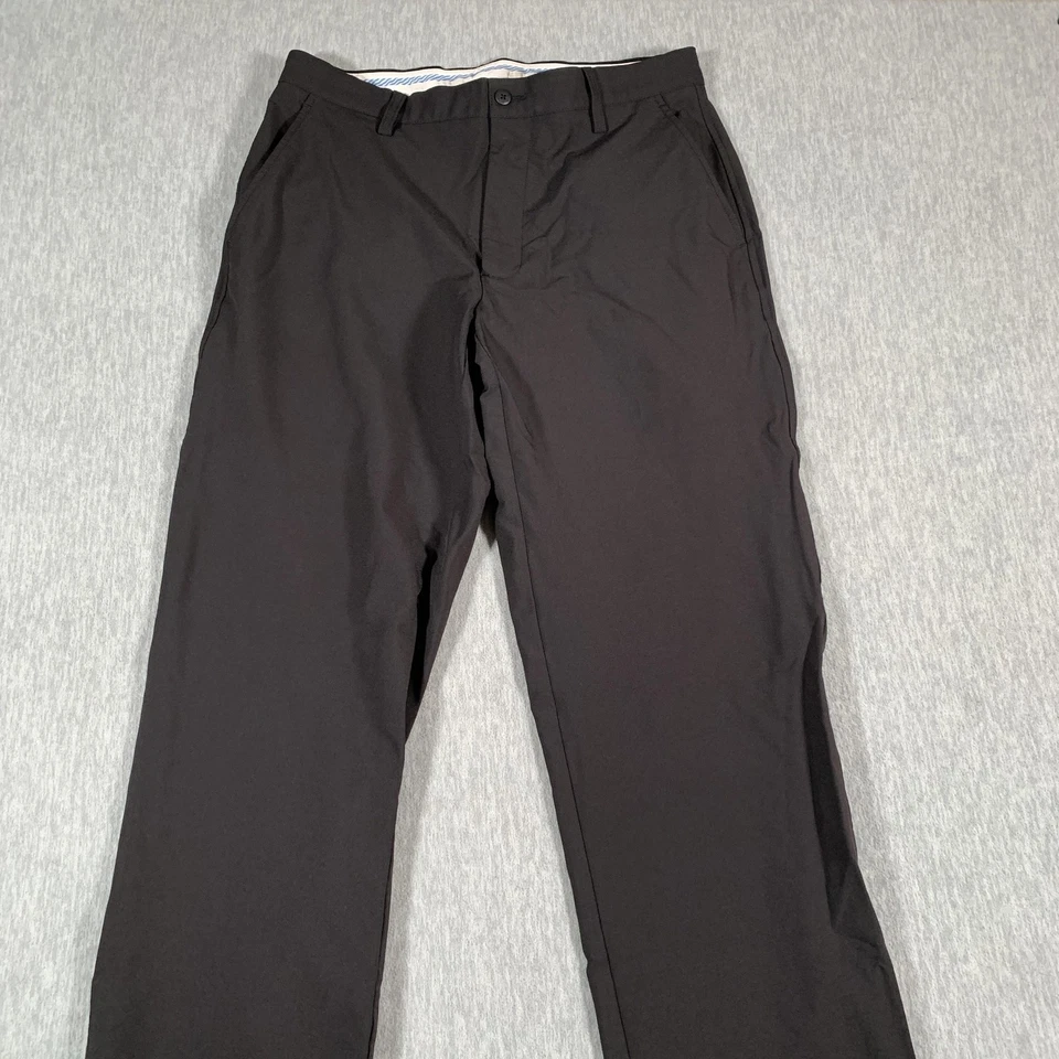 Pantalones de golf FootJoy para hombre 34x30 negros rendimiento elásticos frente plano tecnología chinos Foto 2 de 4