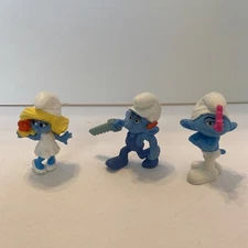 Smurfs Lot of 3 McDonalds 2011 Toys- Grouchy, Smurfette, Handy