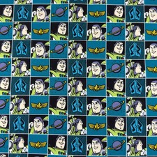 Disney Pixar Toy Story 3 Buzz Lightyear Block Print on Blue Fabric - 1/2 Yd