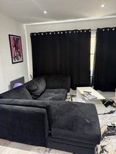 Black Corner Sofa with Center Table