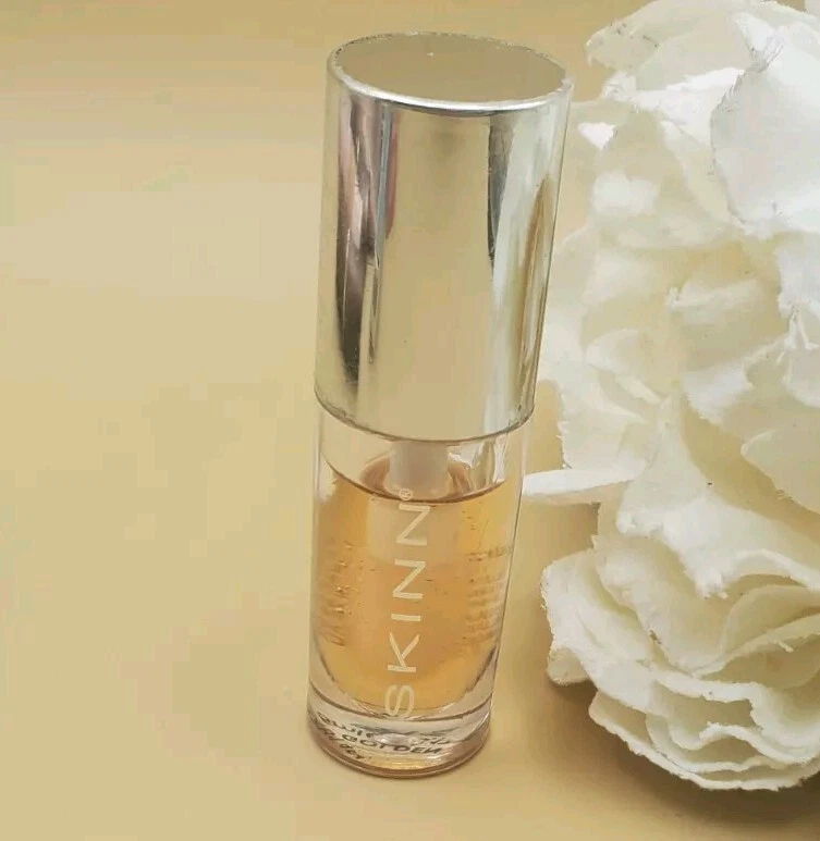 Aceite labial luminoso Skinn Divine Elixir dorado 0,17 oz nuevo sin sello  Foto 2 de 4