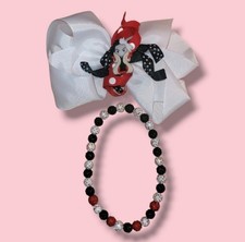 Disney's Villain Cruella De Vil Dazzling Hair Bow & Glamorous Necklace Set