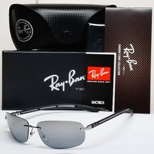 Ray-Ban Sonnenbrille 2011 polarisiert randlos Kohlefaser schwarz RB 8303 004/82