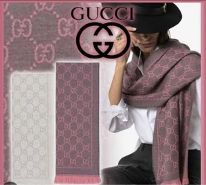 Foulard et silencieux Gucci excellent état longu cm larg cm