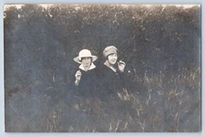 2 Women Wearing Hats & Smoking Real Photo Postcard RPPC c1920